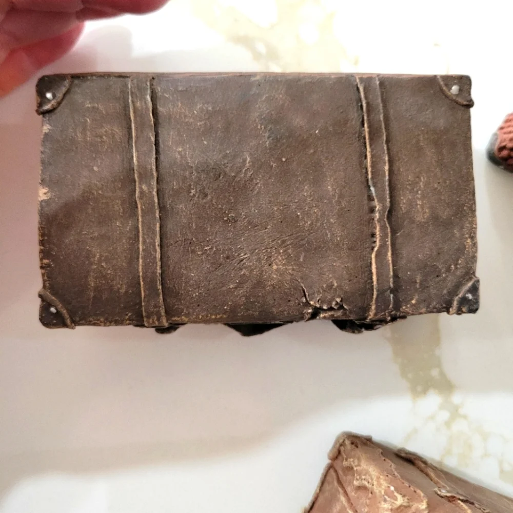 3 miniature resin suitcases